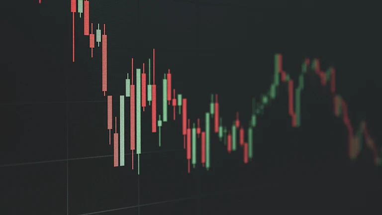 주식 시장 차트를 분석하는 전문 투자자의 모습